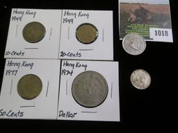 Four-piece Hong Kong Type set of coins and a pair of Foreign coins.