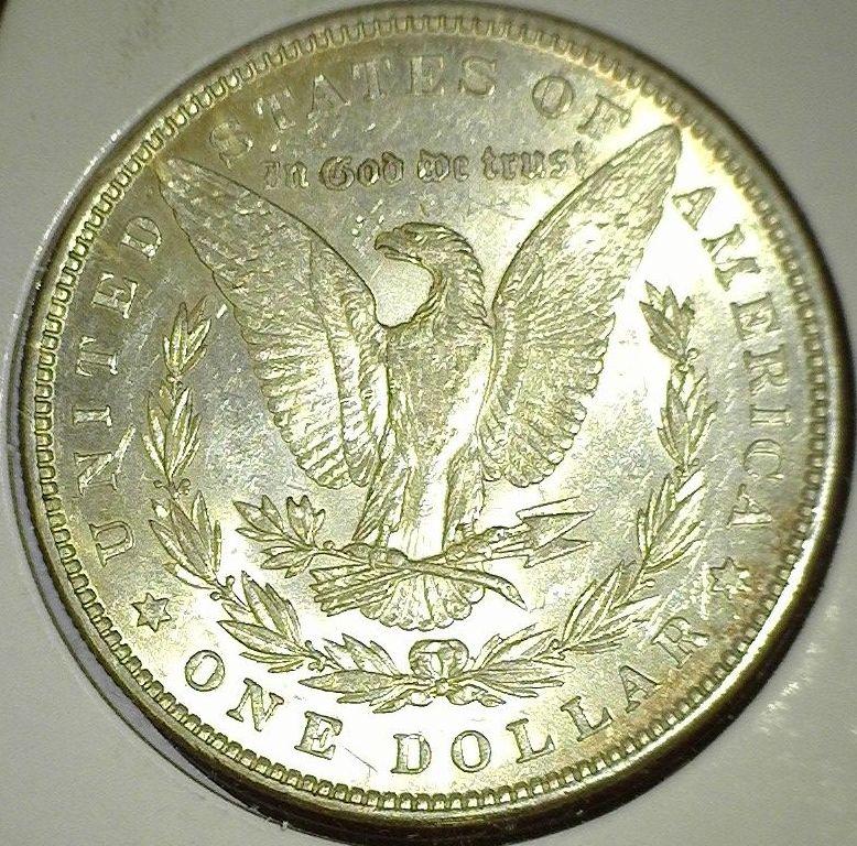 1882 P Morgan Silver Dollar, lightly toned High grade.