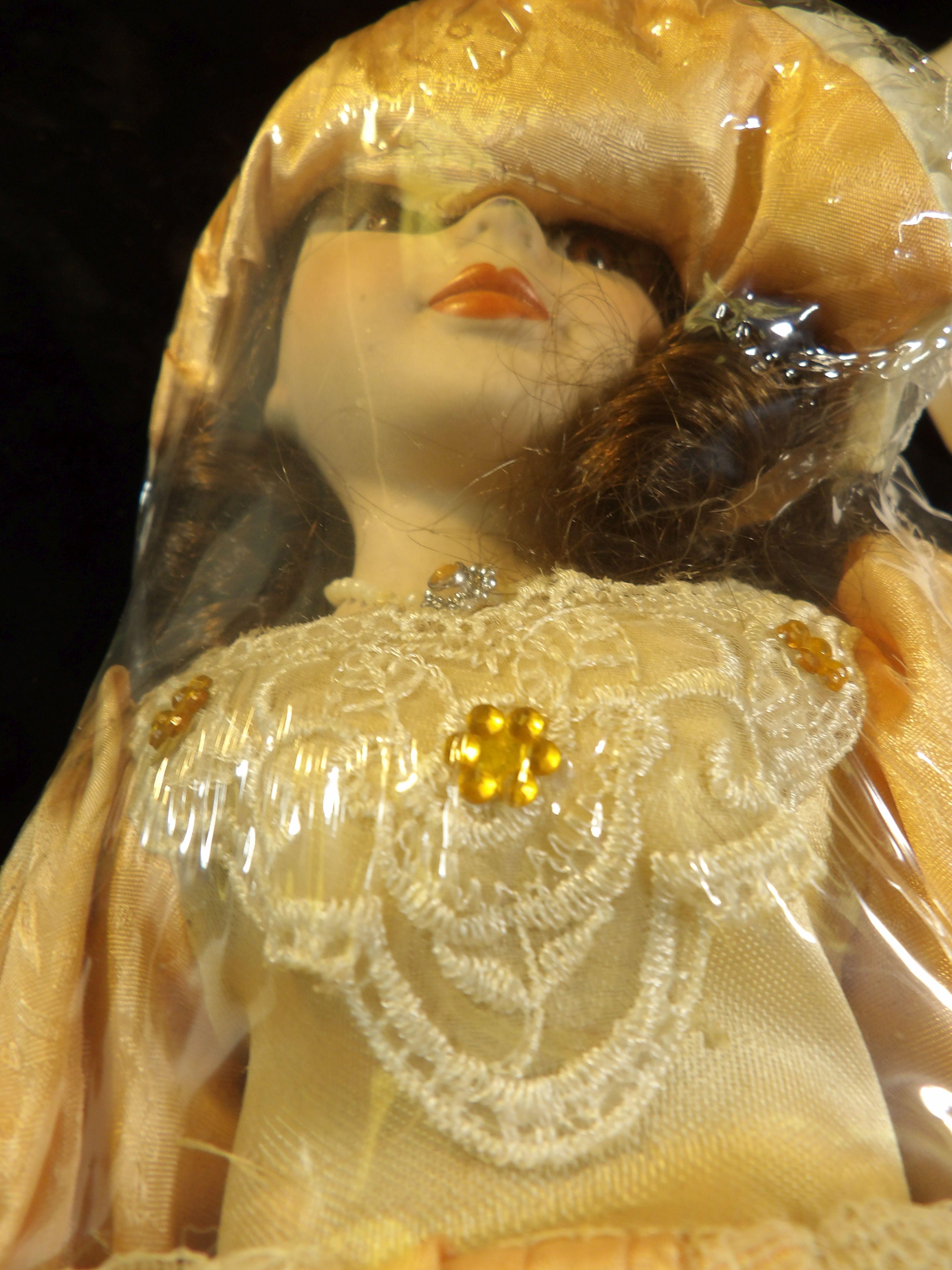 Brunette Doll 16" dressed in an elegant laced dress.