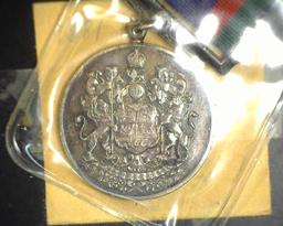 1939-1945 Canada WW2 Voluntary Service  Medal In Uncirculated Condition With Original Ribbon and Pin