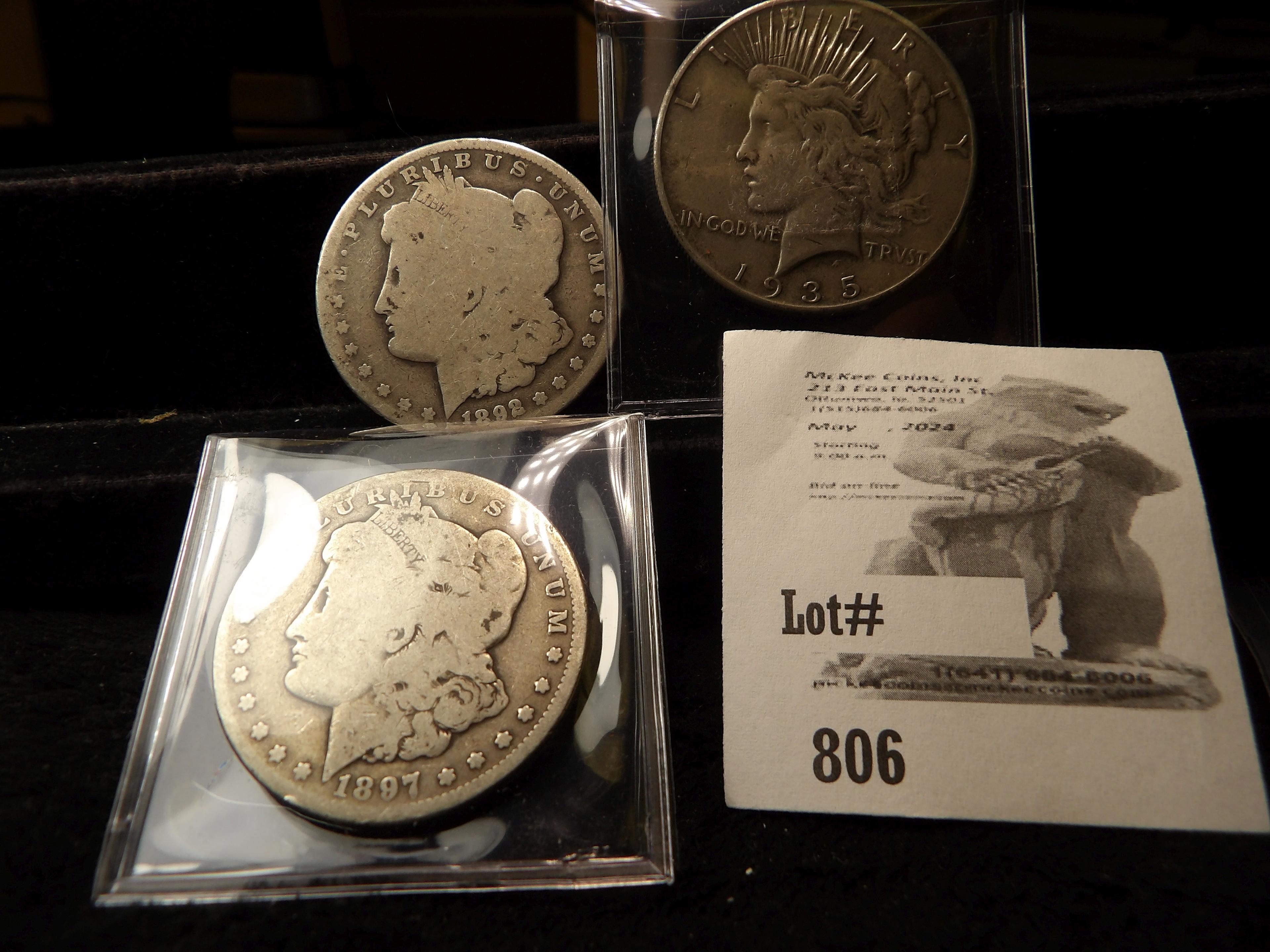 1892 O, 1897 S AG-G Morgan & 1935 P F-VF Peace Silver Dollars.