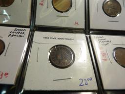 (13) Cents in a plastic page. Includes an 1863 Civil War Token, Poor Man's Double Dies and etc.
