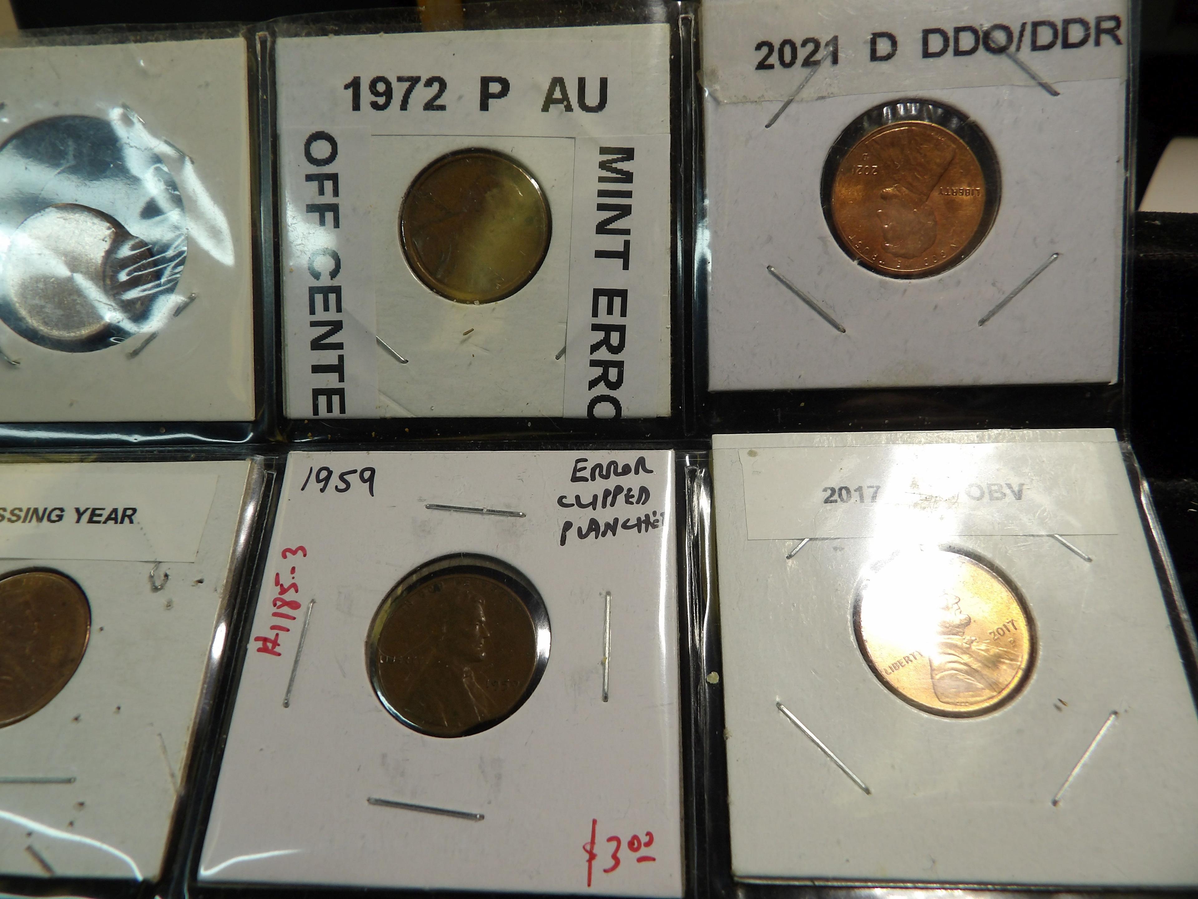(18) Cents in a plastic page including various Mint errors.