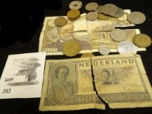A ragged Netherlands 2 1/2 Gulden Note & a France Five Franc note as well as a selection of Foreign