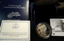 2009 P Silver Proof Abraham Lincoln Commemorative Silver Dollar in original U.S. Mint Box of issue.