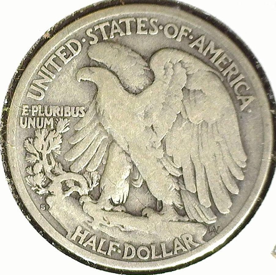 1927 S Silver Walking Liberty Half Dollar, VG-Fine. Semi key date. Carded.