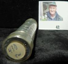 1943 D High Grade Roll of World War II Steel Cents in a plastic tube, which has shrunk holding the c
