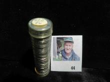 1943 D High Grade Roll of World War II Steel Cents in a plastic tube, which has shrunk holding the c