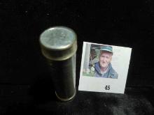 1943 High Grade Roll of World War II Steel Cents in a plastic tube, which has shrunk holding the coi
