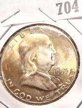 1953 S Franklin Half Dollar, Gem BU with golden obverse toning.