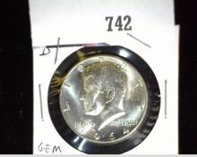 1964 D Gem BU Kennedy Silver Half Dollar.