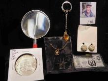 Necklace 14K Gold Tone in original packaging; Magnifying glass; Pair of clip on simulated Pearl earr