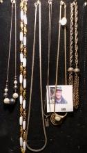 Group of six old Antique Necklaces. One has a Silver Bar hanging from it.