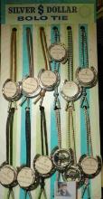 (12) Silver Dollar Bolo Ties on Sales Stand up Display. (No coins) Made in U.S.A.