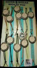 (12) Silver Dollar Bolo Ties on Sales Stand up Display. (No coins) Made in U.S.A.