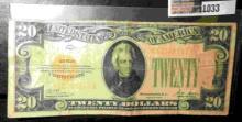 Series 1928 $20 Gold Certificate with yellow seal. Circulated.