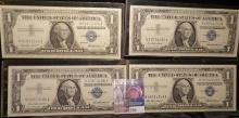 (4) High grade Series 1957 $1 Silver Certificates in plastIc sleeves.