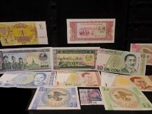 (11) Crisp Uncirculated Foreign Bank Notes. (7) Kyrgyzstan, (3) Laos, & (1) Latvia.