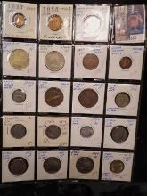 (19) Foreign Coins with a total of .0926 oz. of Silver. All stored in a 20-pocket plastic page.