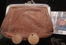 Leather two-pocket Coin purse with a pair of holed 1863 Civil War Tokens.
