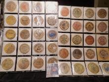 (40) Nebraska Wooden Nickels in a pair of plastic pages.
