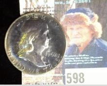 1962 P Toned Silver Proof Franklin Half Dollar.