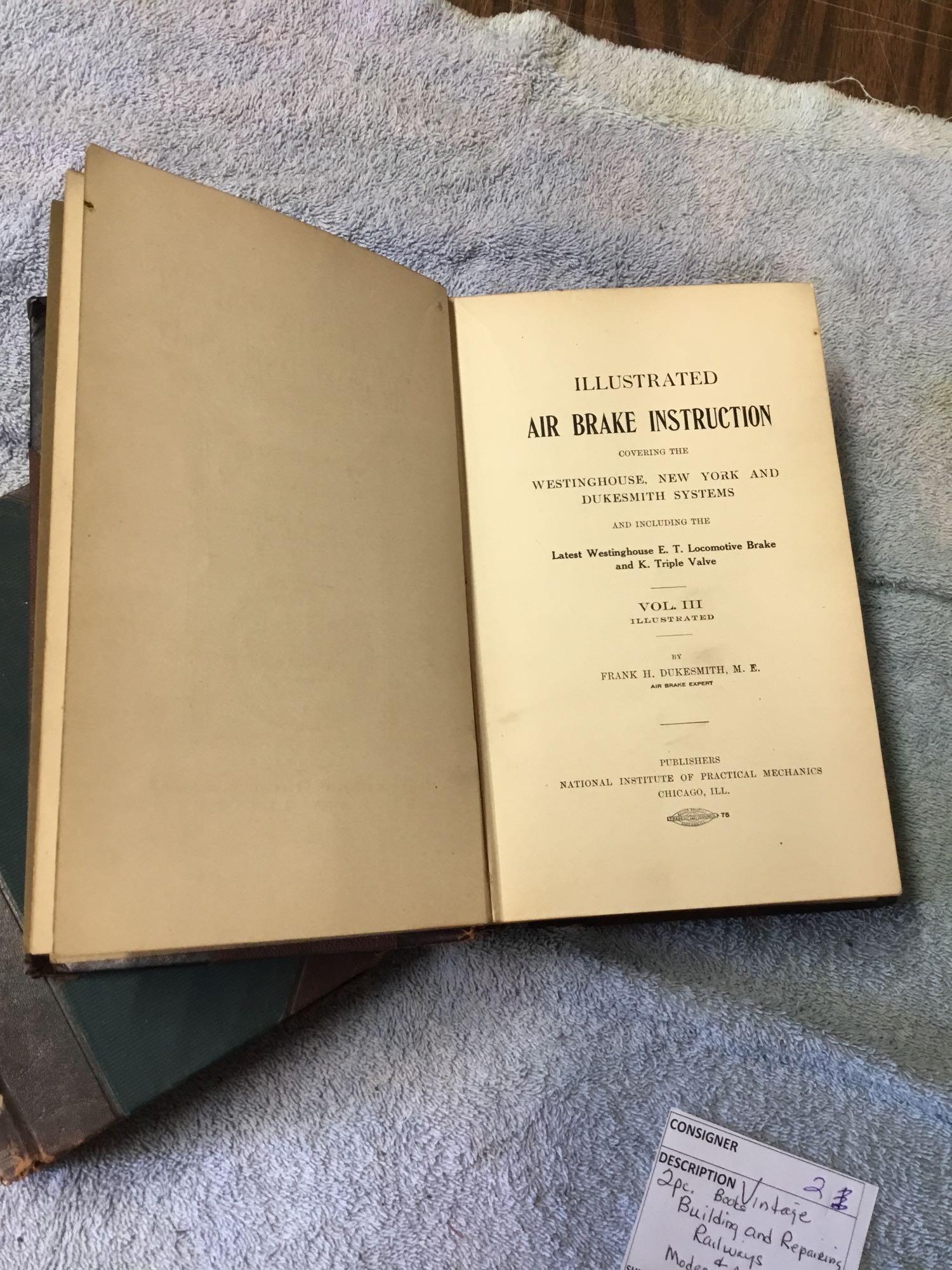 vintage 2pc. books, building, and repairing railways