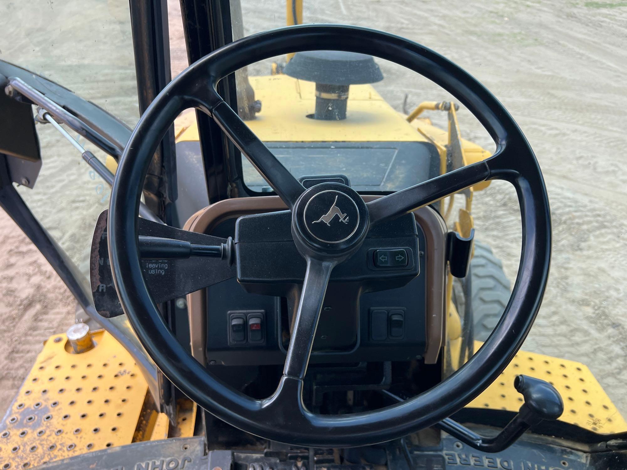 1998 JOHN DEERE 310E BACKHOE