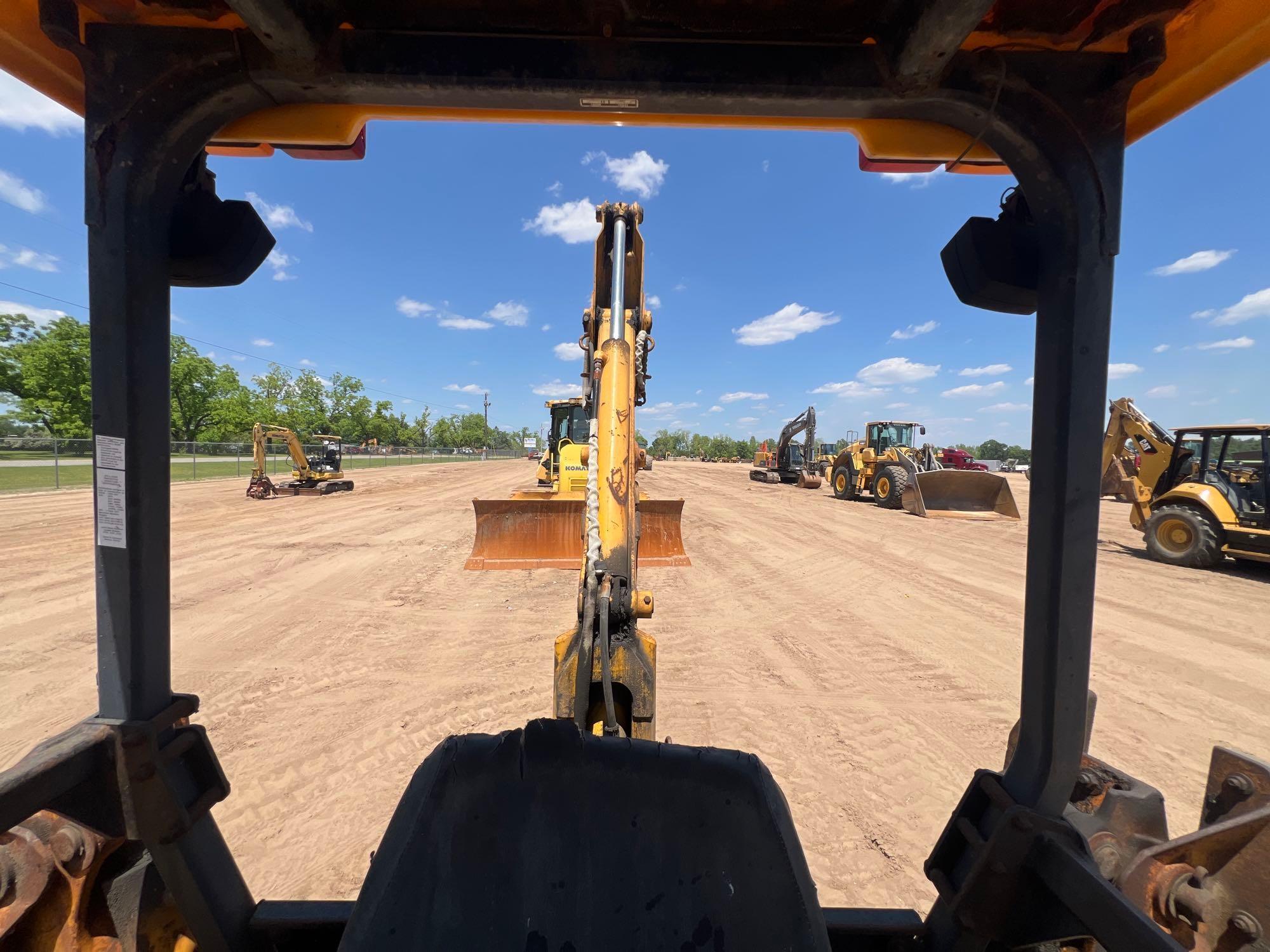 1990 JOHN DEERE 310C BACKHOE