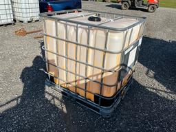 Used 275 Gallon Tote in Cage