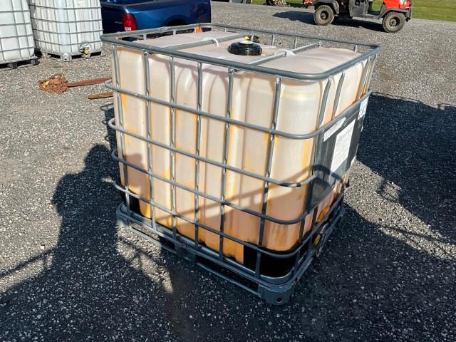 Used 275 Gallon Tote in Cage