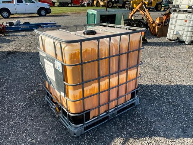 Used 275 Gallon Tote in Cage