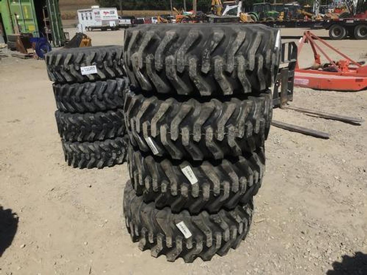 12-16.5 Skid Steer Tires on 8 Lug Rims