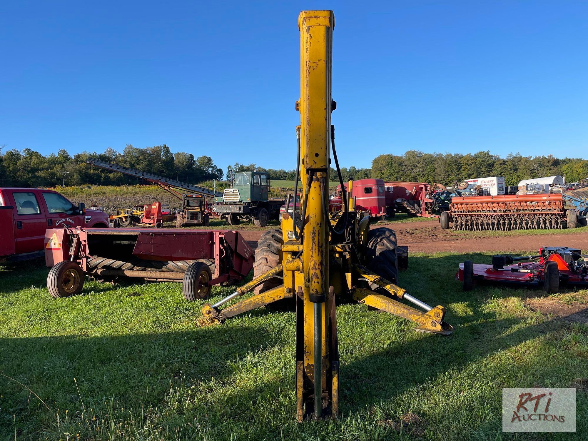 International 3414 diesel backhoe with forks and bucket