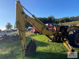 International 3414 diesel backhoe with forks and bucket