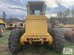 John Deere 570A grader, Runs and operates, 10' moldboard, Front scarifier