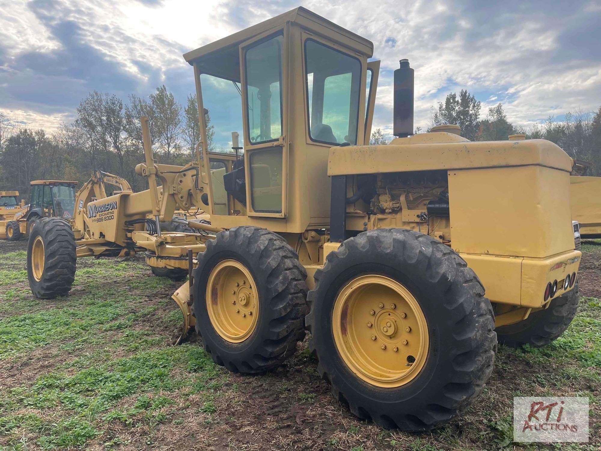 John Deere 570A grader, Runs and operates, 10' moldboard, Front scarifier