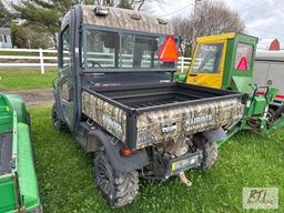 Kubota X1100C 4WD utility vehicle with cab, hydraulic dump, heat, A/C, 930 hrs