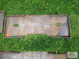 Universal skid steer mounting plate