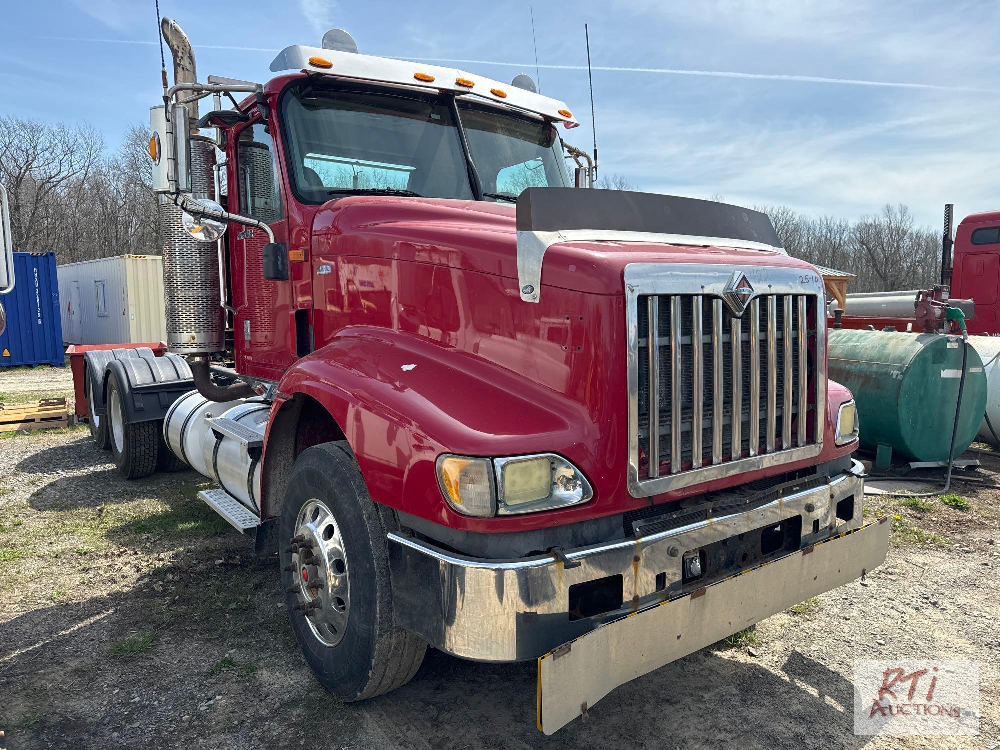 2013 International day cab tandem tractor with wetline, 18 speed, MaxxForce engine, 14K fronts, 46K