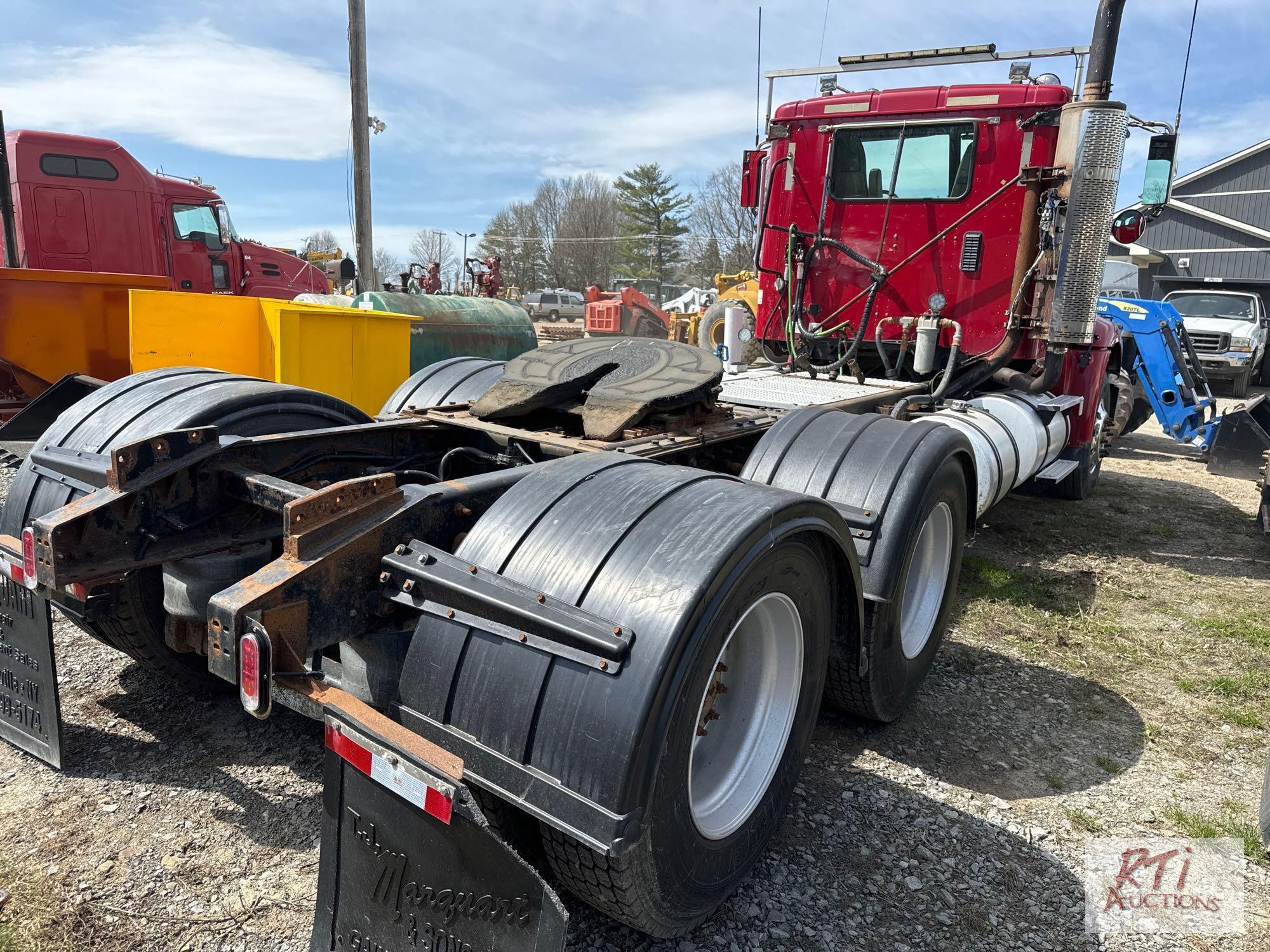 2013 International day cab tandem tractor with wetline, 18 speed, MaxxForce engine, 14K fronts, 46K