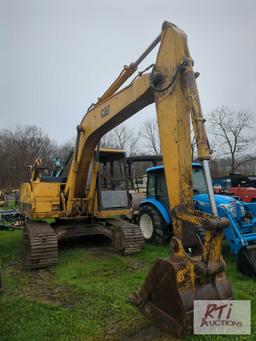 Cat E110B excavator, 36in pin on digging bucket, cab, heat, 8177 hrs., S/N 210649, missing front