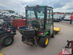John Deere X758 lawn tractor, 4WD, 52in front hydraulic sweeper, rear spin spreader, Curtis cab, 574
