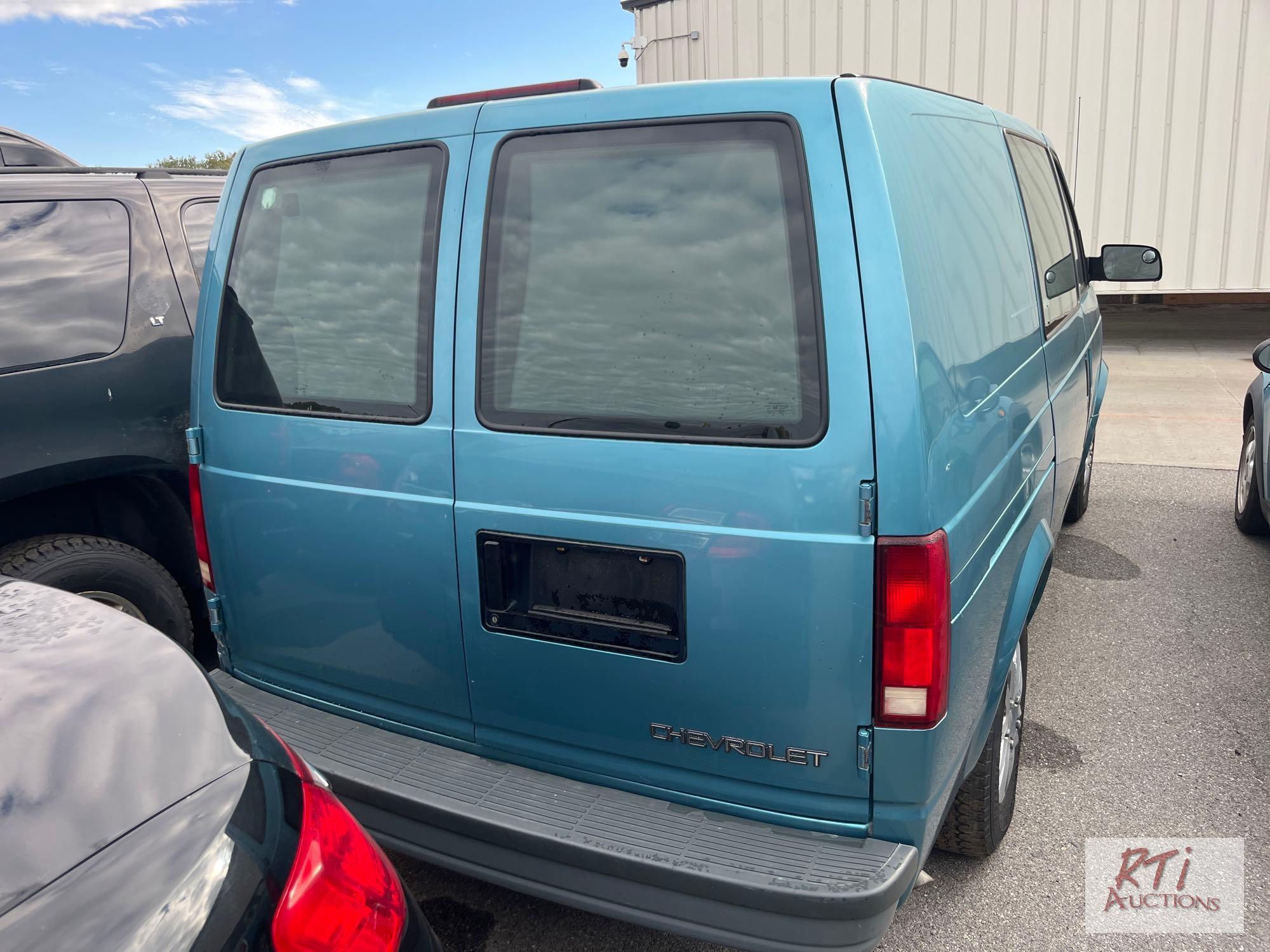 1996 Chevy Astro Van, A/C, 47,916 miles, custom rear upholstery, VIN:1GCDM19W7TB113634, Title Delay