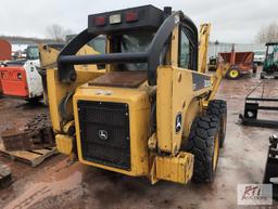 John Deere 317 skid steer loader, cab, rear weights