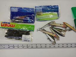 Assorted fishing lures, tackle box, fish basket