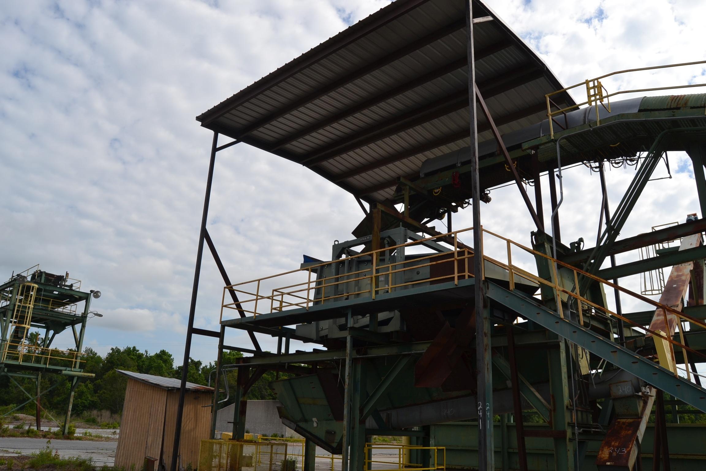 STEEL SUPPORT, CATWALK, AND BUILDING AT THE