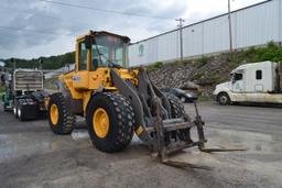 VOLVO L70E ARTICULATING WHEEL LOADER W/ QUICK ATTACH W/ FORKS W/ ENCLOSED CAB W/ 20.5X25 RUB 21,821