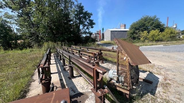 IRVINGTON MOORE 7' STACKER W/BREAK DOWN W/INFEED CHAIN LOCATIED IN ELKINS WV