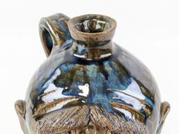 9-1/2in Dal Burtachell Multi Glaze Face Jug